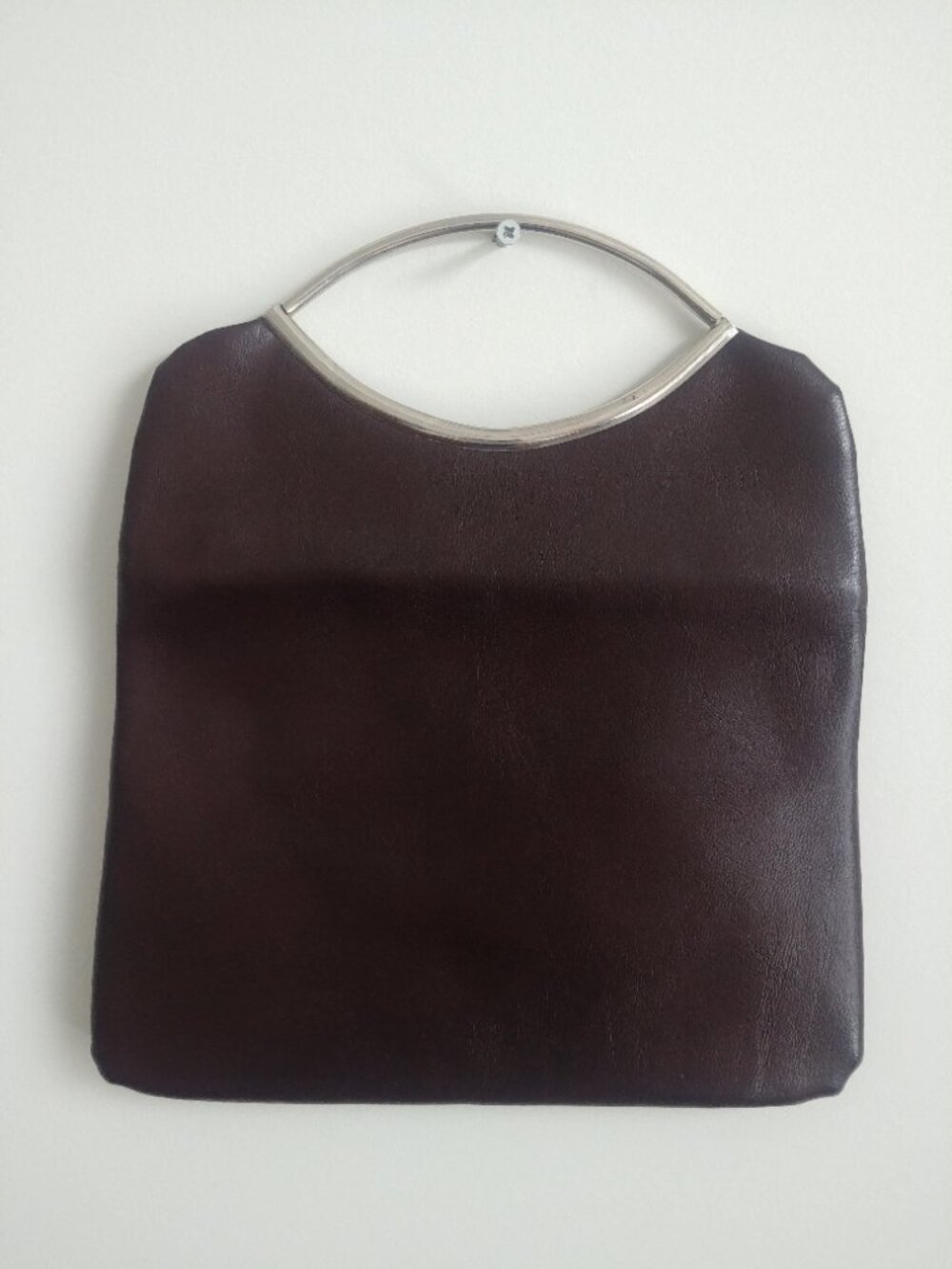 Vintage minimalist classic small dark brown flat leather bag with silver handle